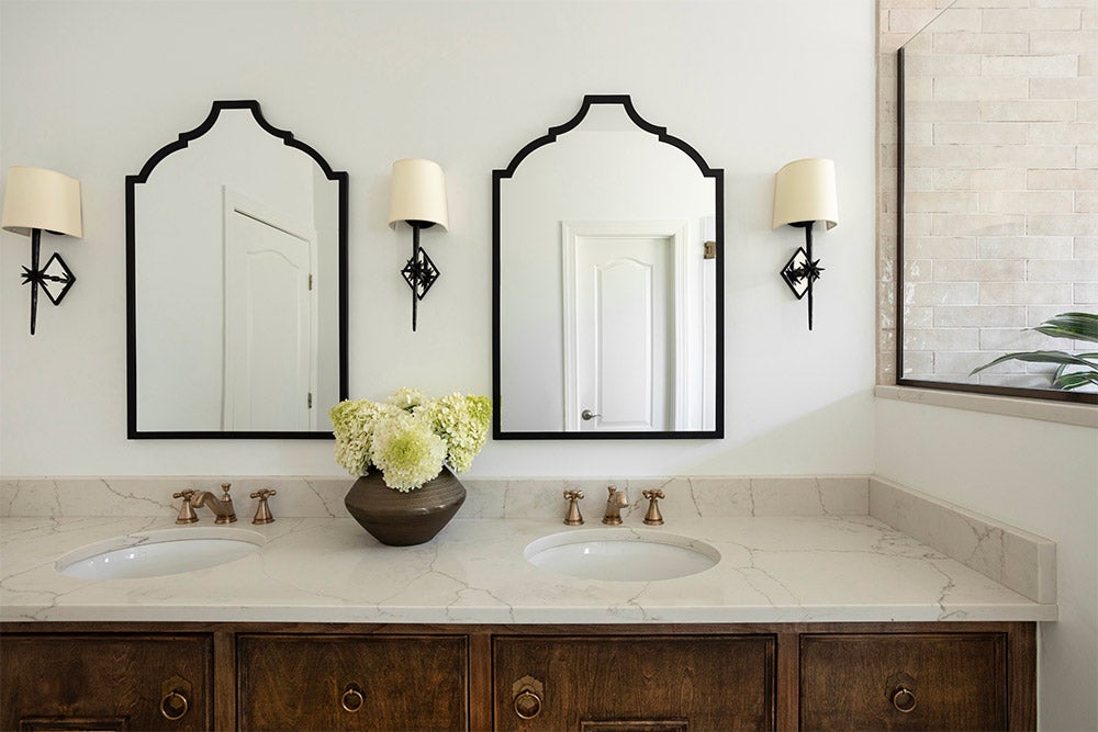 Modern bathroom remodel with dual sinks and arched mirrors by AMI Build best Bathroom Remodeling Contractor Brentwood, Franklin TN Nashville.